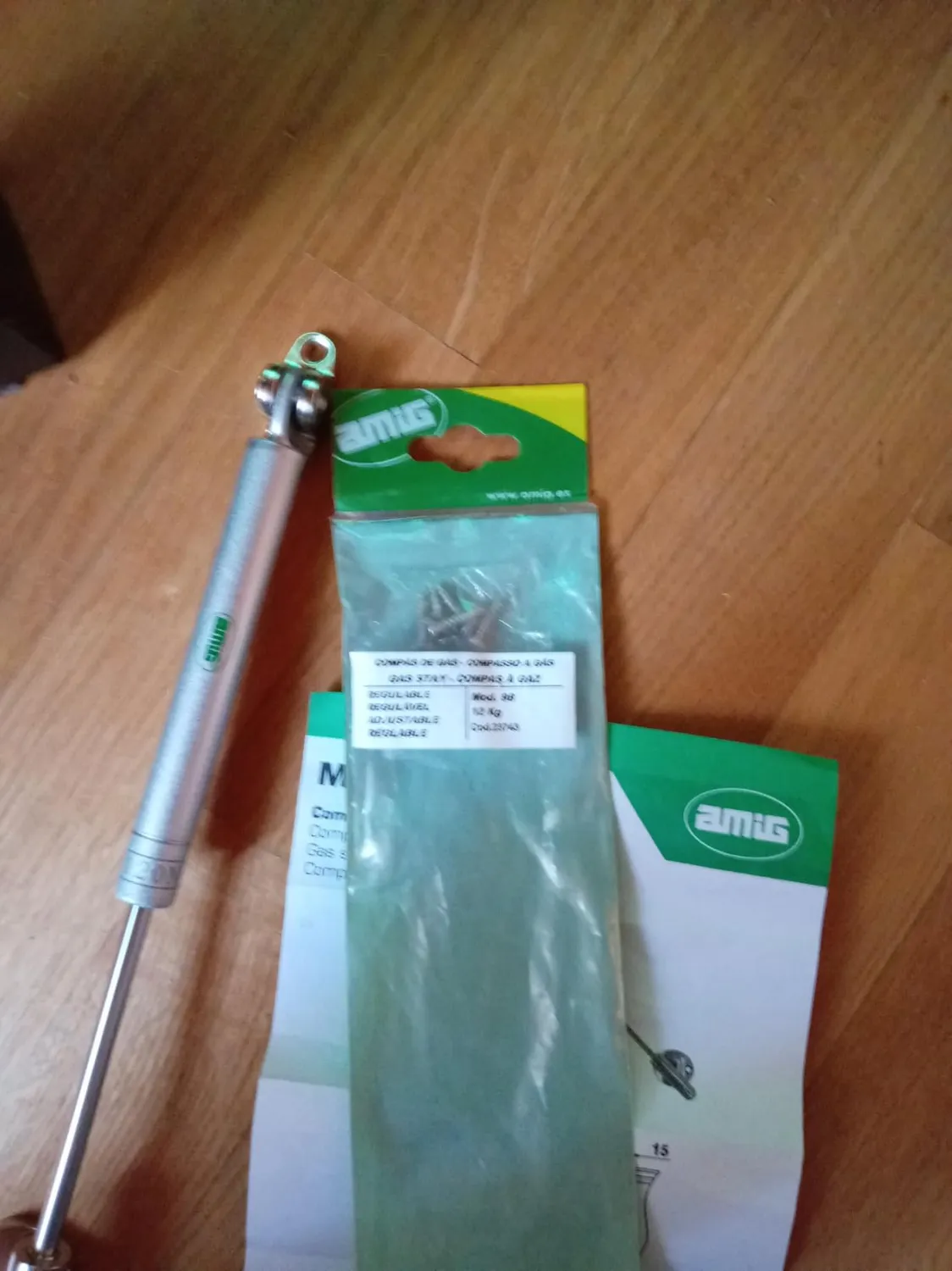 Amig Mod.98 compasso a gas 12 kg argento anta ribalta